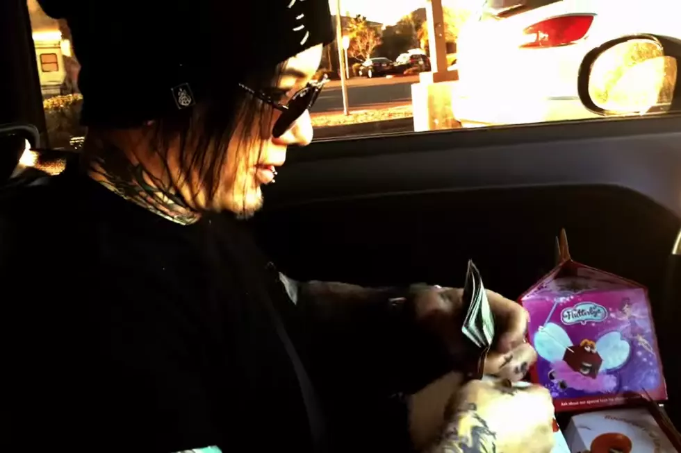 DJ Ashba Spreads Holiday Cheer by Giving Las Vegas Homeless Happy Meals Stuffed With $100 Bills