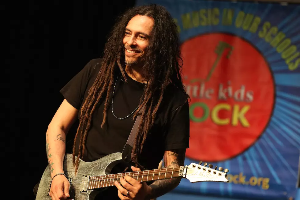 Korn’s Munky Helps Deliver New Musical Instruments to California School